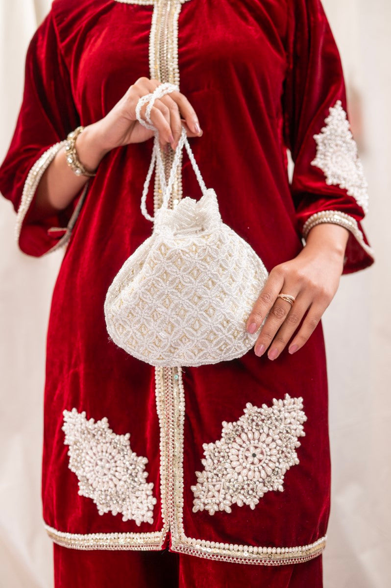 Milky White Potli with Pearl and Golden Thread Work
