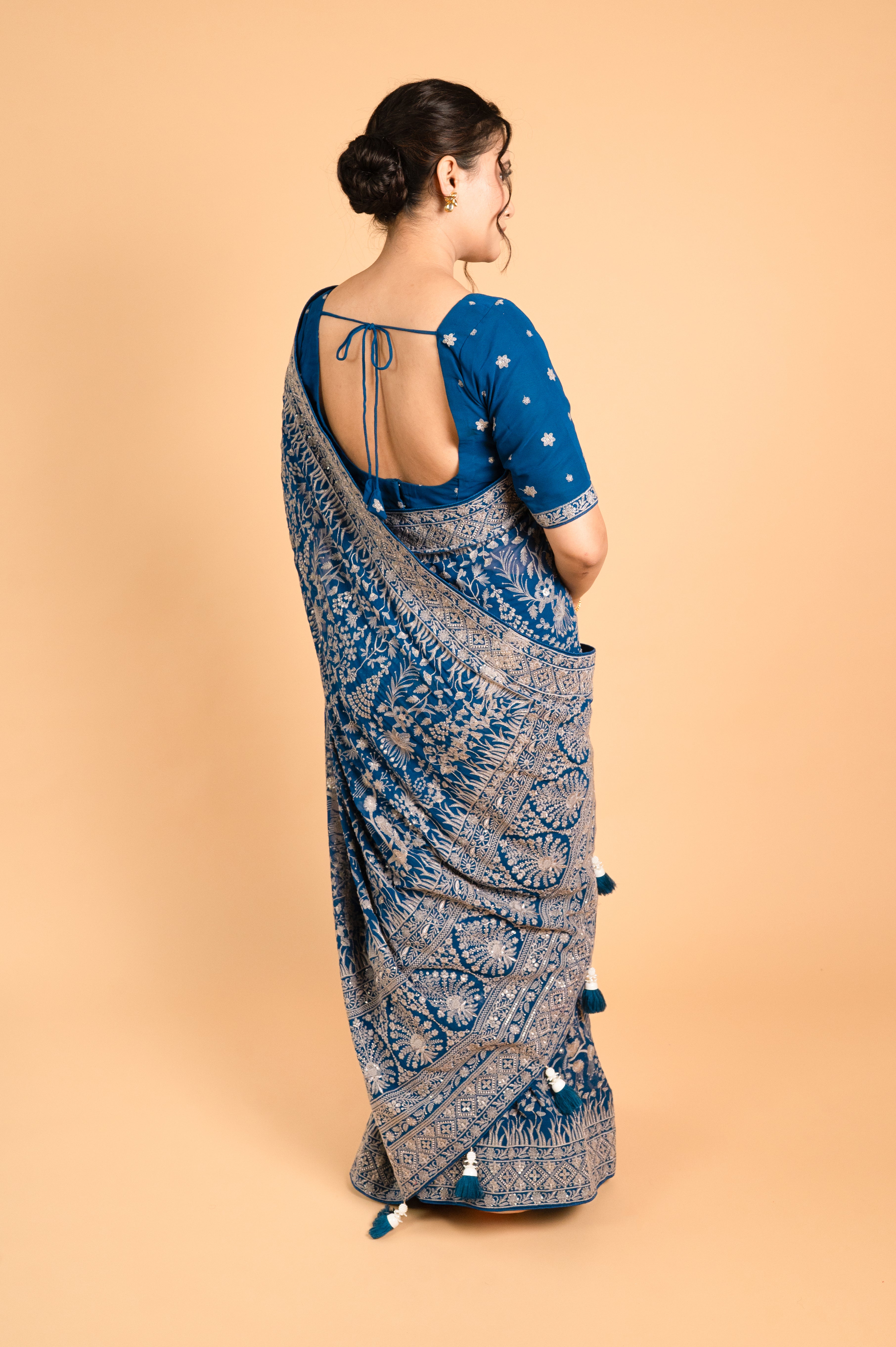 Teal Blue Lucknowi Georgette Saree with Beautiful Tassels and Zari Work
