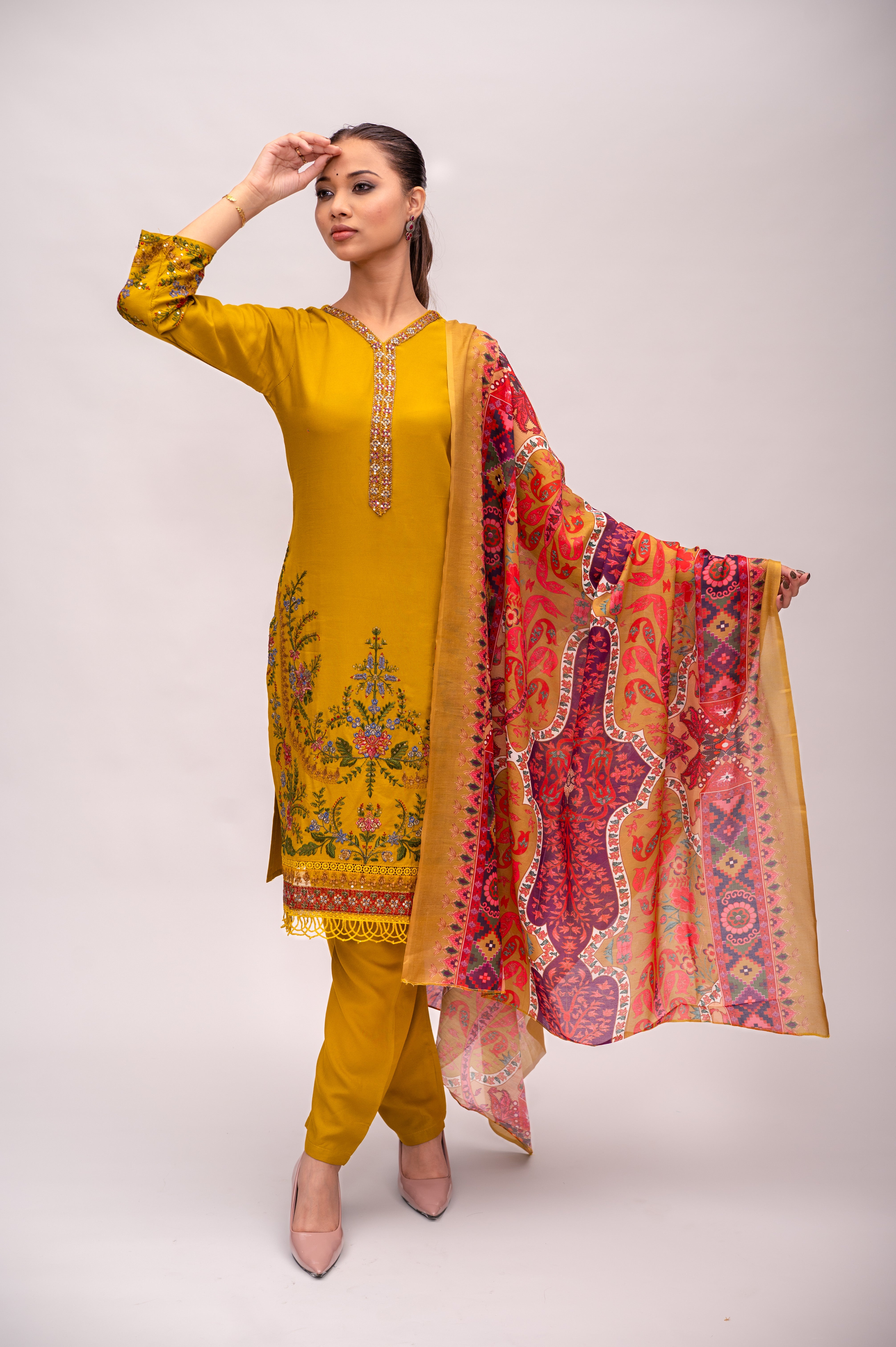 Marigold Yellow Cotton Suit with Embroidery with a Malmal Printed Dupatta