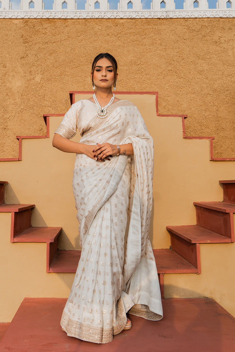 Cream Silk Saree with Golden Buti Work and Rich Zari Border