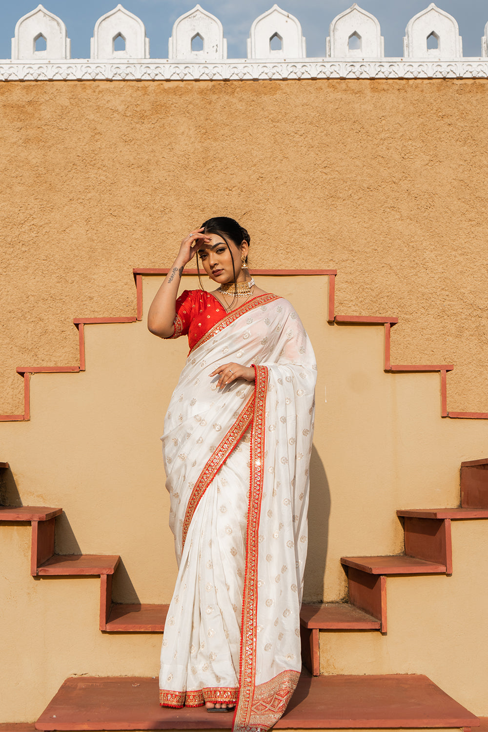 Cream Silk Saree with Golden Buti Work and Rich Red Zari Border