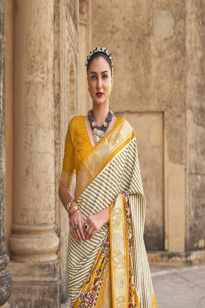 Yellow with Multi-Color Golden Border Viscose Silk with Patola Design and Apoxy Work - Mayrake