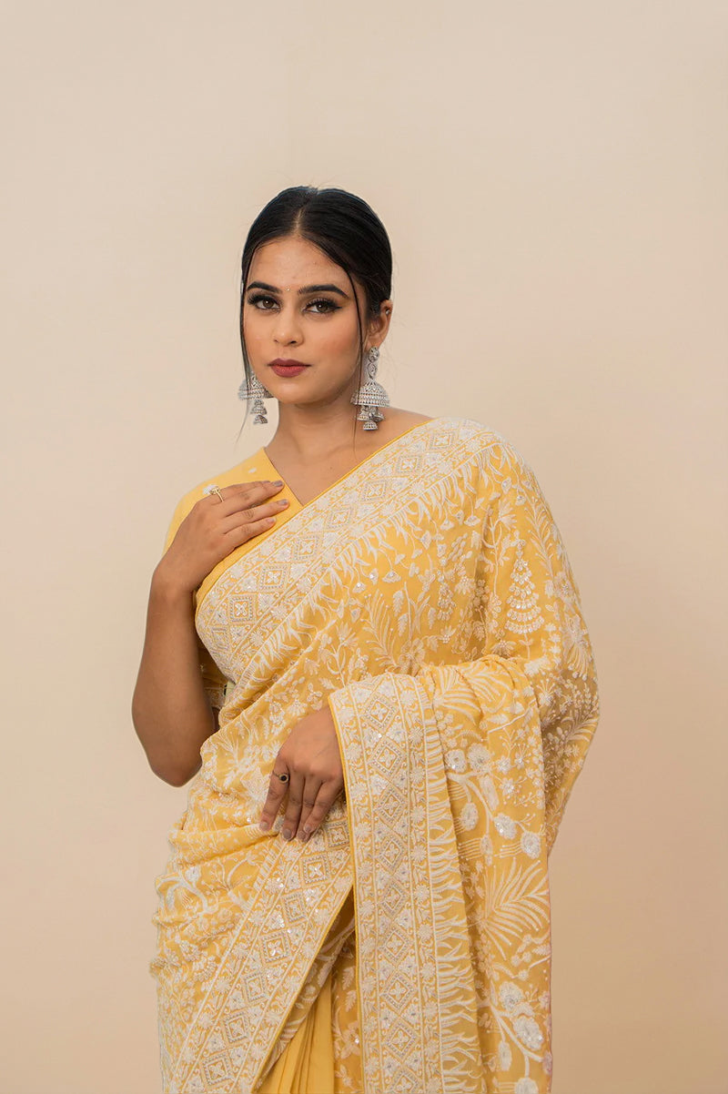 Light Yellow Lucknowi Georgette Saree with Beautiful Tassels and Zari Work
